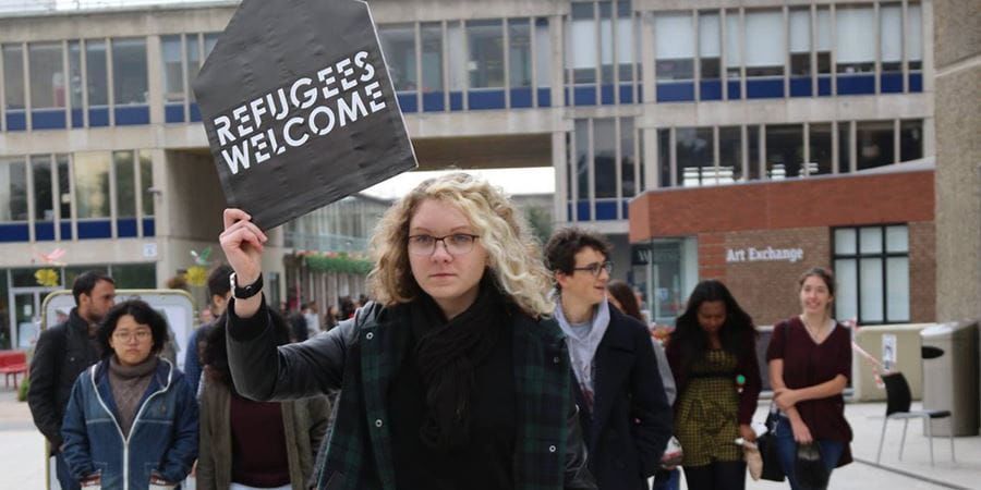 Student talking into a microphone