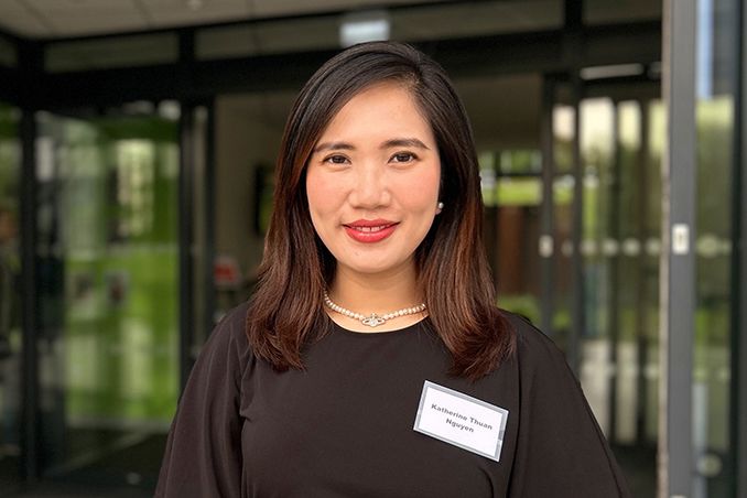 Student talking into a microphone