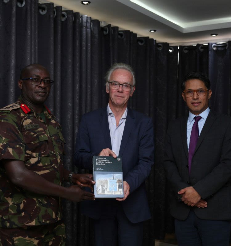 Pictured from left: Commandant of the Humanitarian Peace Support School at the International Peace Support Training Centre, Col J K Rongoei, with Professor Han Dorussen and Dr Prabin Khadka.