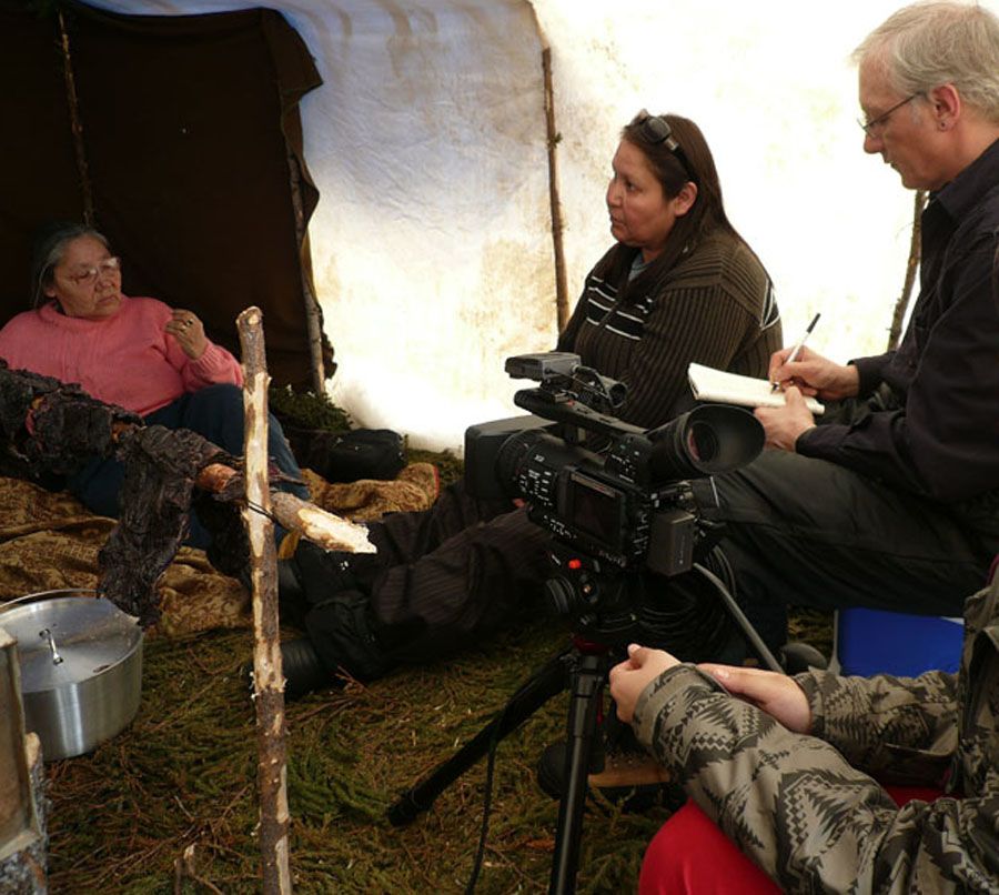 Colin Samson interviewing Innu woman in tent
