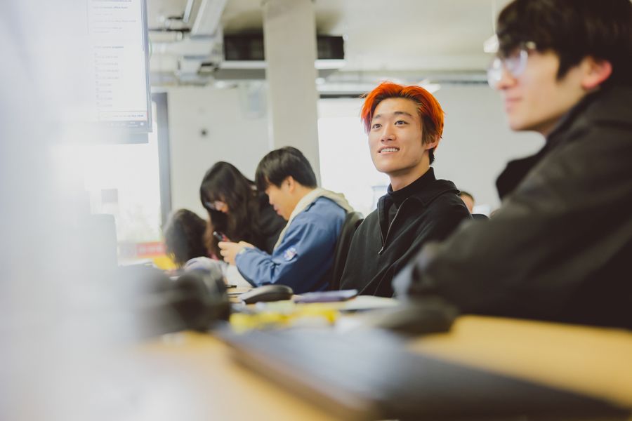 Students sitting in front of computers
