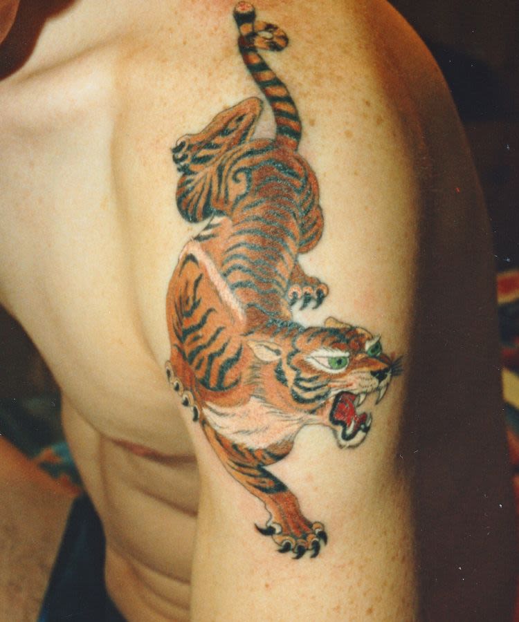 A tattoo by Mr Sebastian of a tiger, snarling, courtesy of the Bishopsgate Institute