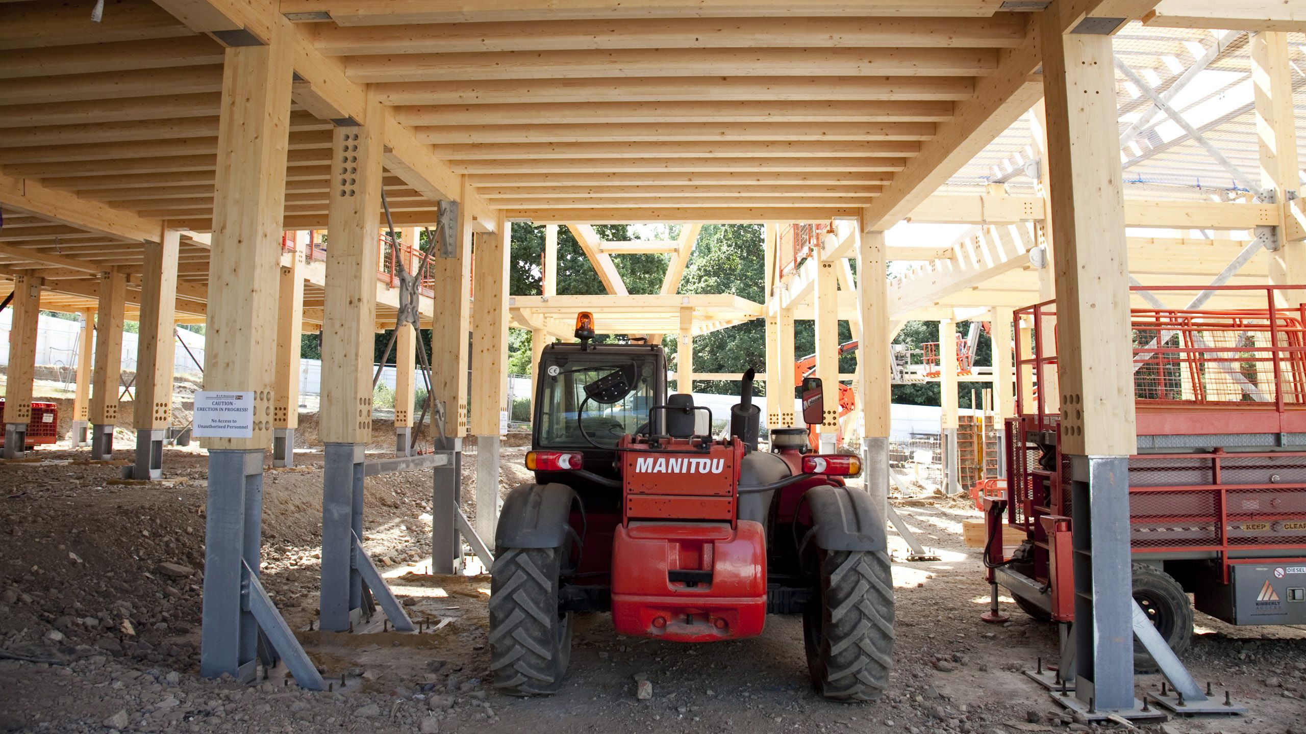 A construction vehicle under the wooden floor of EBS.