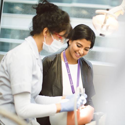 Student talking into a microphone
