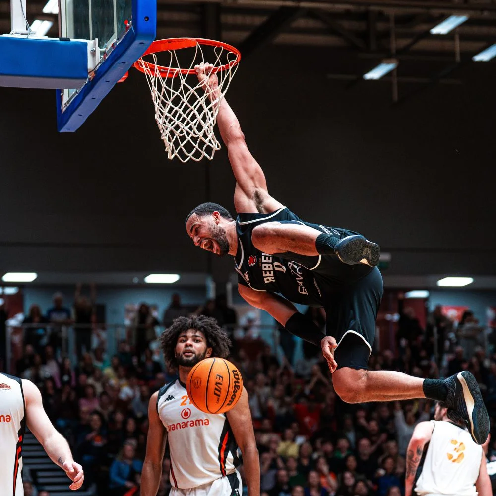 Essex Sport Basketball player scoring a basket